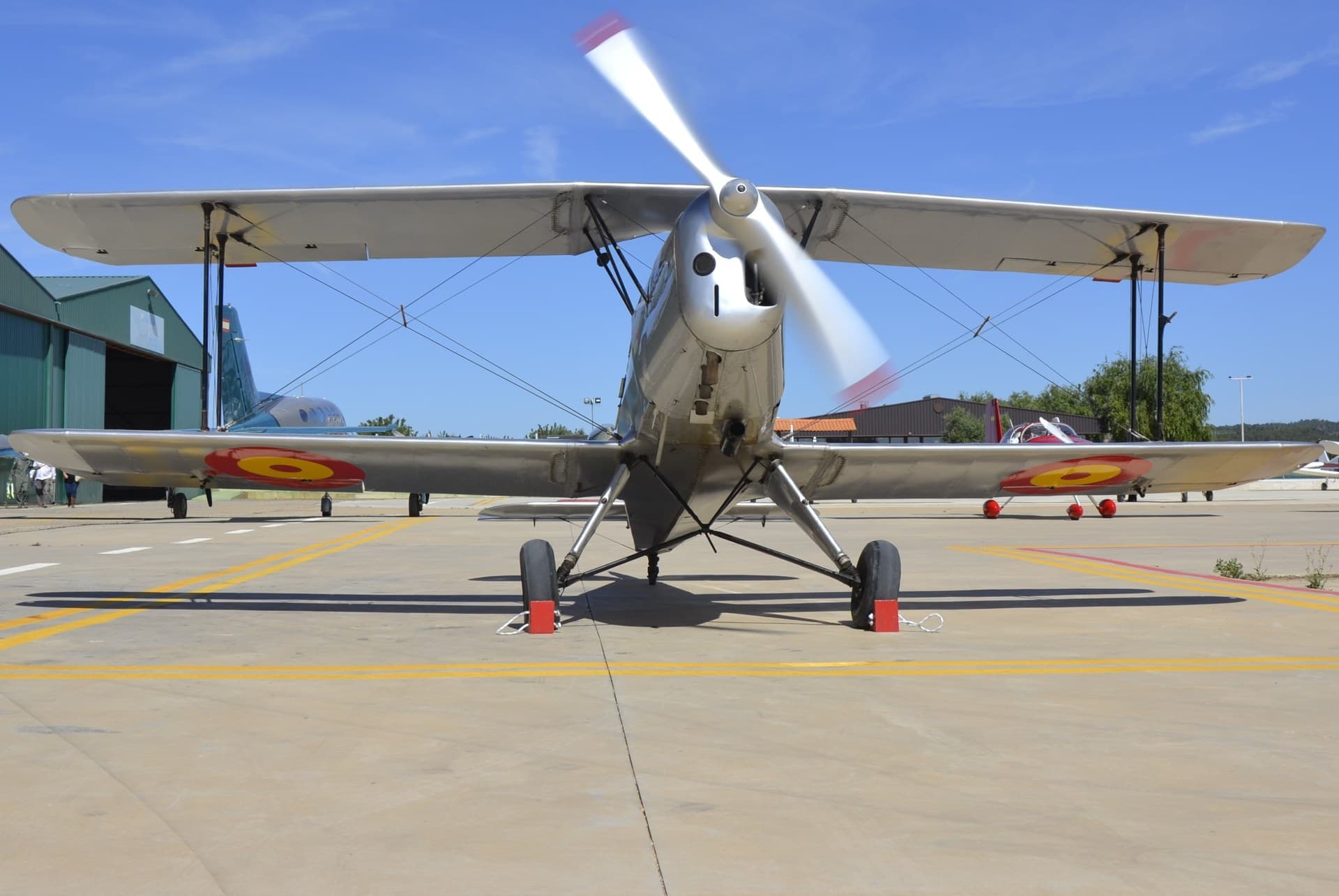 A Spanish-registered CASA C.1131E Jungmann, registration EC-GIS, on the ground
