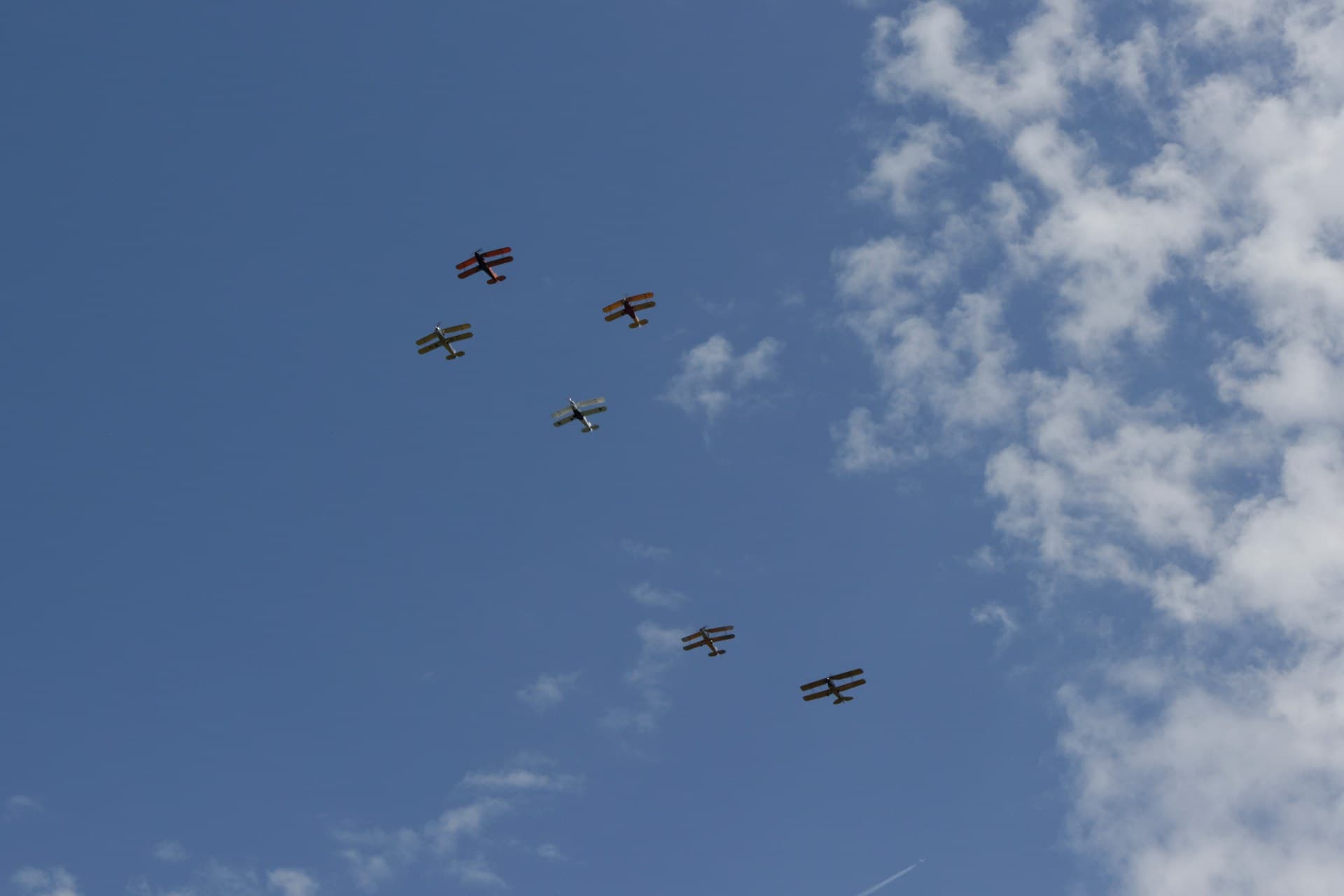 A Bücker Jungmann flying at the Meeting Aérien de la Ferté-Alais