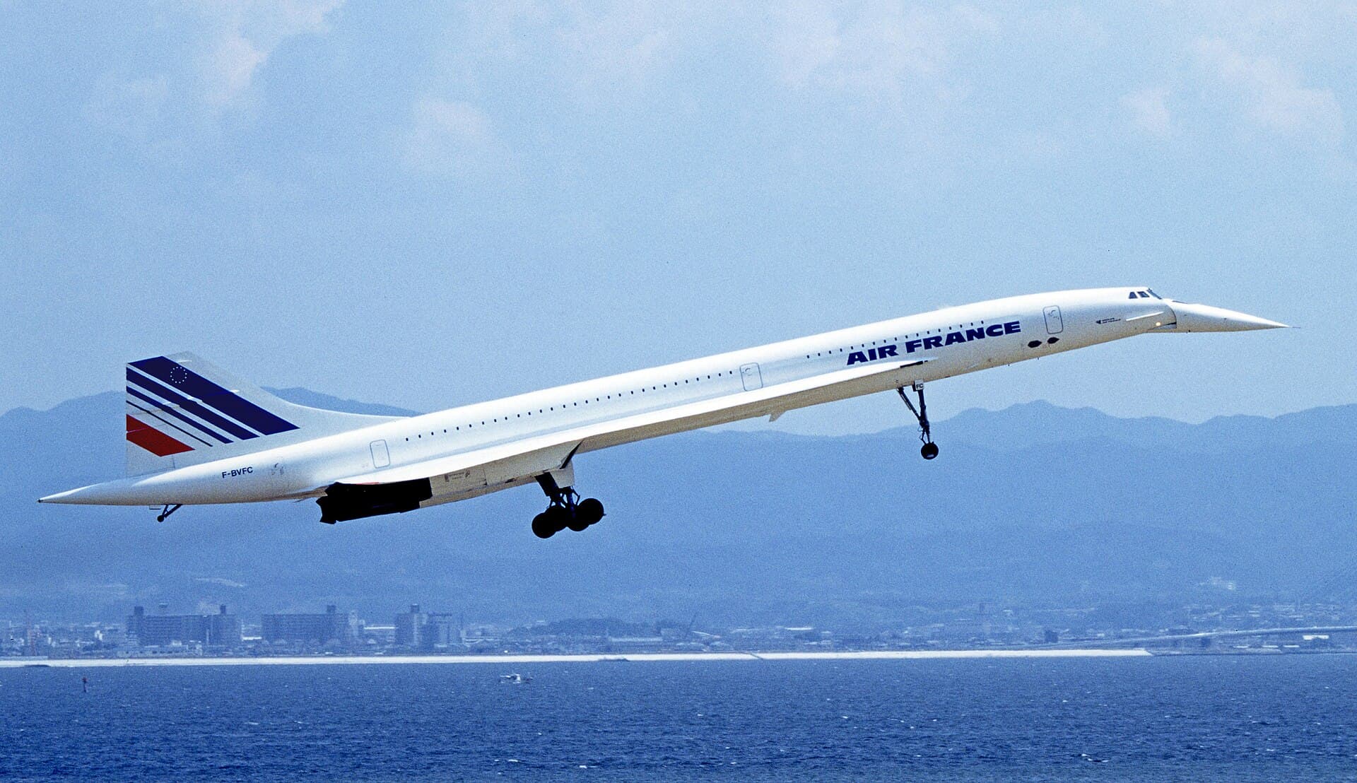 An Air France Concorde landing at Kansai International Airport in 1994, nose drooped and undercarriage extended