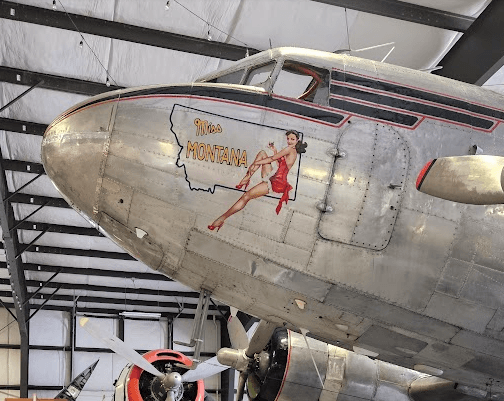 The nose of the preserved DC-3 'Miss Montana', carrying pin-up nose art, on display at the Museum of Mountain Flying in Missoula