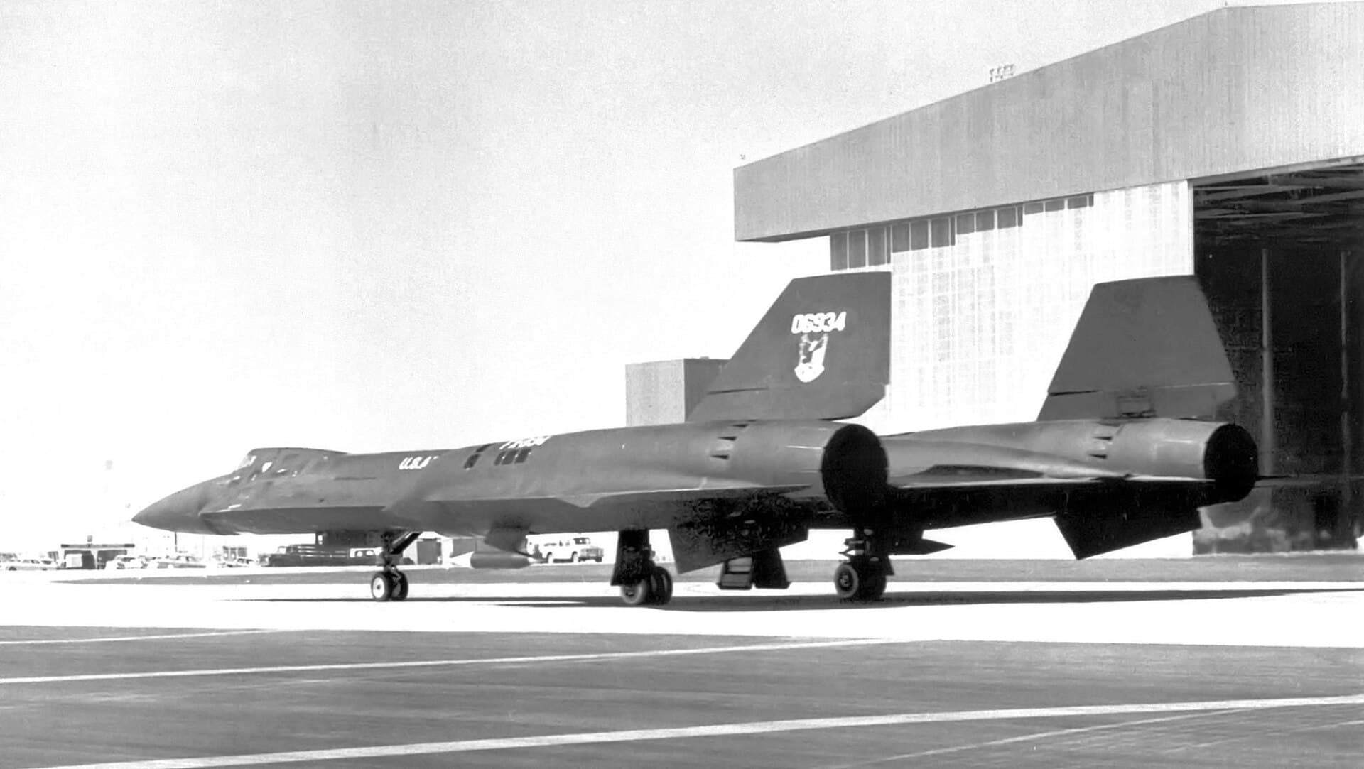 The YF-12A interceptor prototype 60-6934 taxiing in 1963 Air Defense Command markings, its rounder chine and missile bays distinguishing it from the SR-71