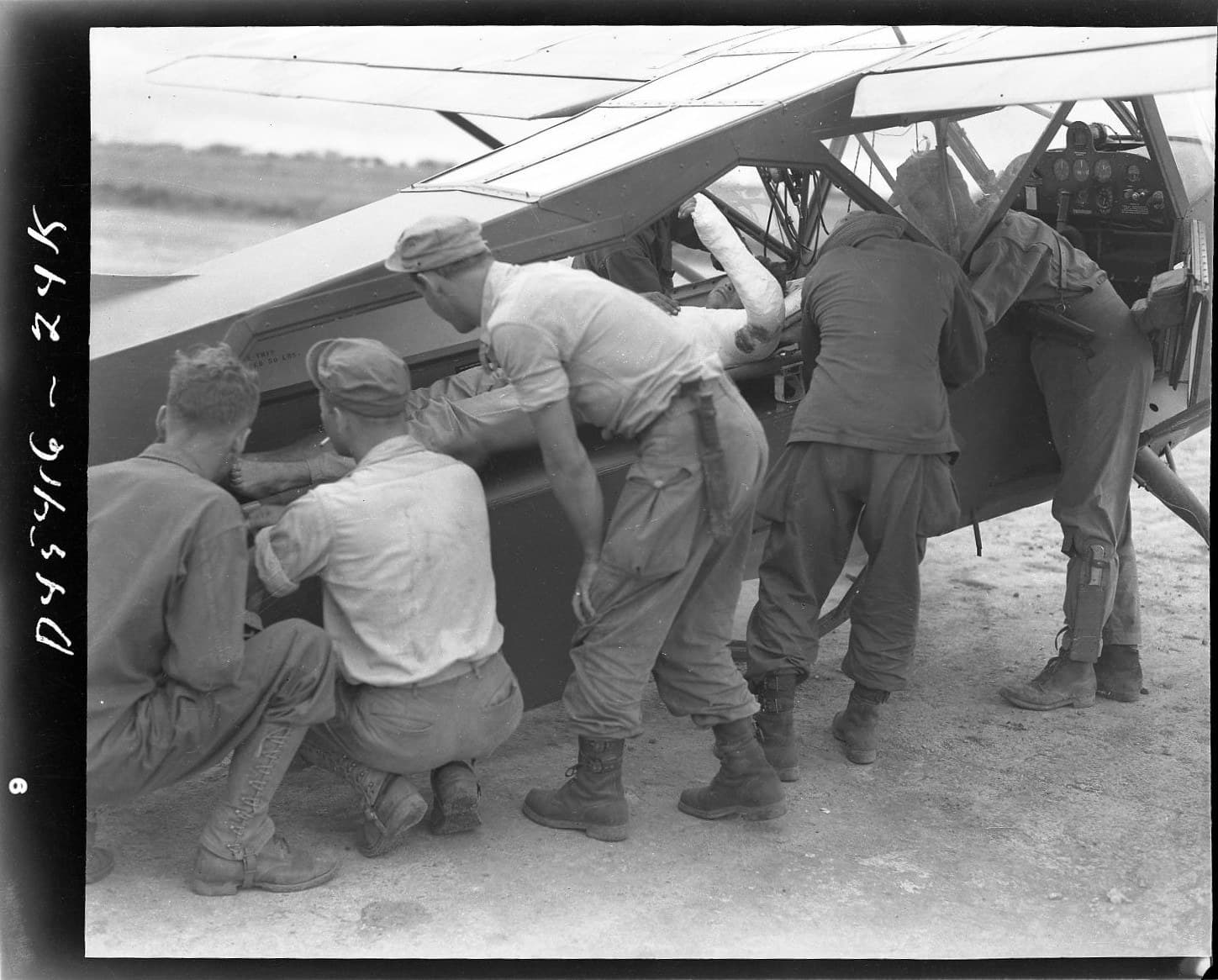 The enlarged rear hatch of a Stinson L-5B Sentinel, fitted for loading a stretcher casualty