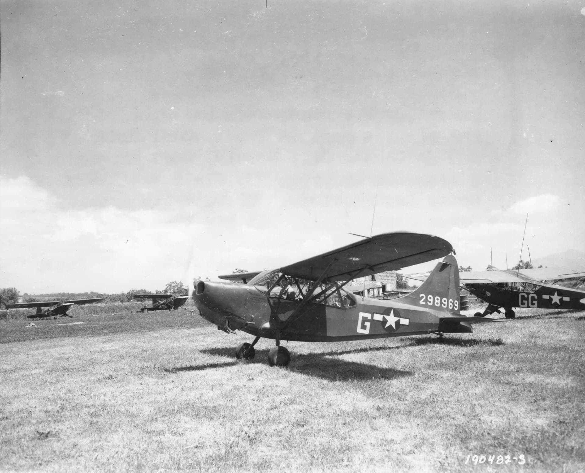 A mechanic prepares an L-5 for an artillery-reconnaissance flight near Sessa, Italy, May 1944