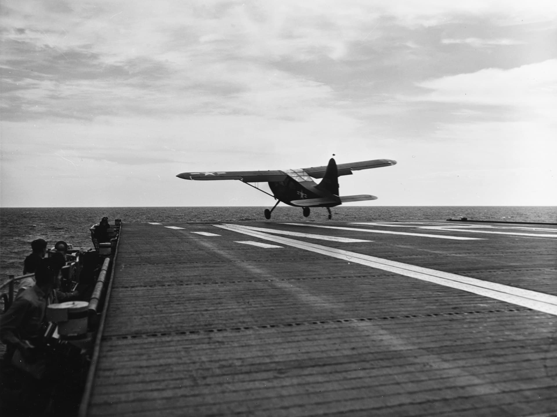 An OY-2 Sentinel is launched from the escort carrier USS Sicily off Korea, September 1950