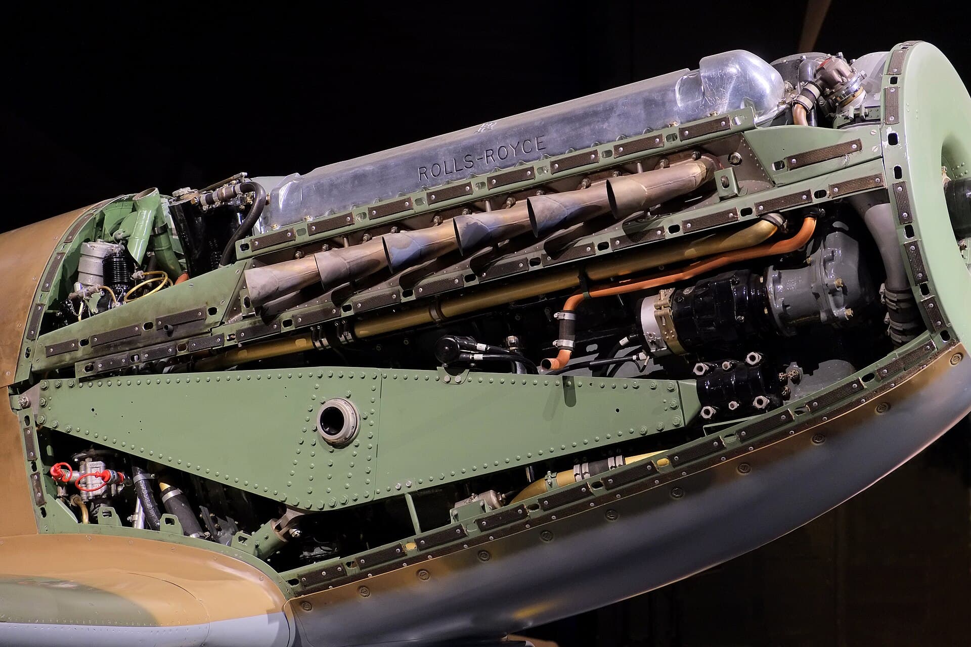 The Rolls-Royce Griffon engine of a preserved Spitfire Mk XIV exposed beneath open cowlings