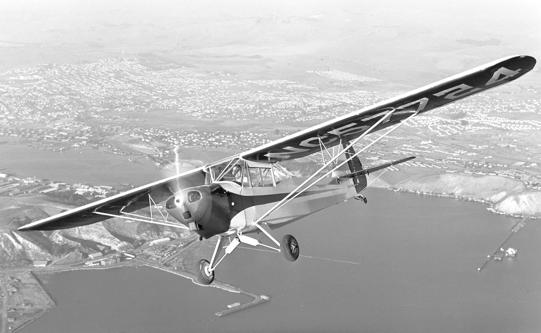 A surplus Taylorcraft L-2M Grasshopper converted back to civilian flying colours