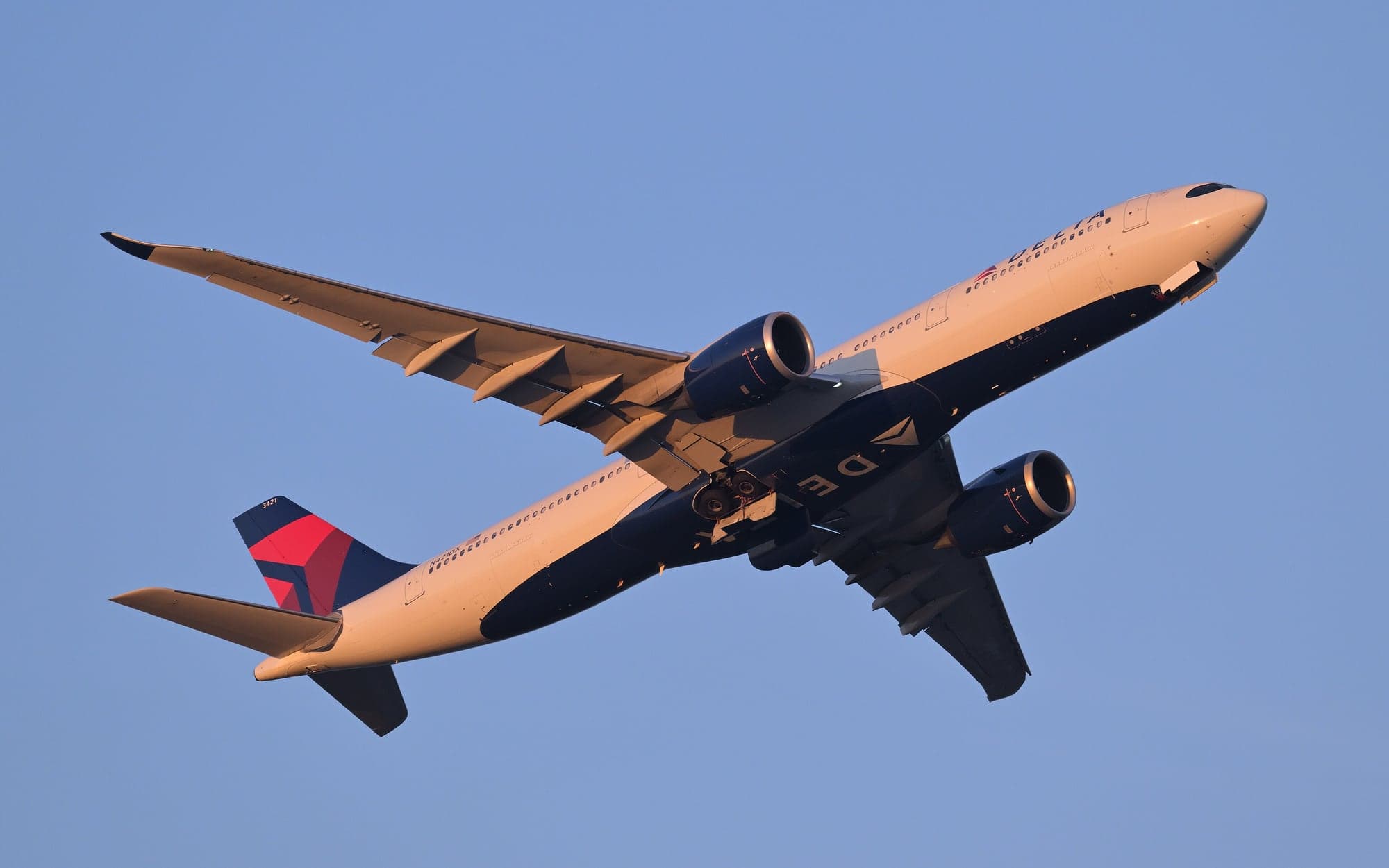 Delta Airbus A330-900 N421DX departing Boston for Europe in August 2025.