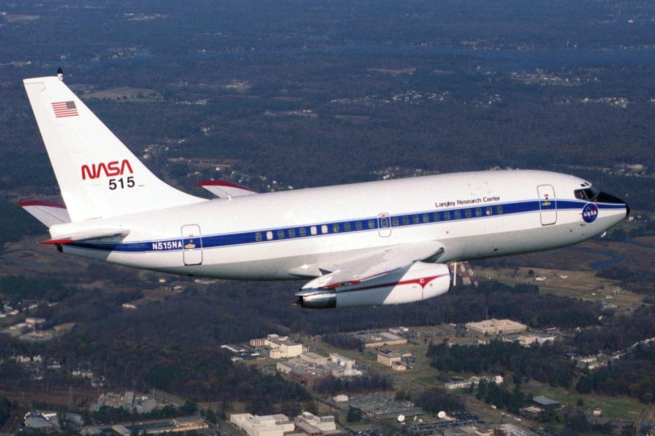 NASA 515, the Boeing 737-130 flown by NASA's Langley Research Center as a flying laboratory, photographed in November 1989. It carried the airborne Doppler radar trials that produced the wind-shear detection systems now required on US airliners.