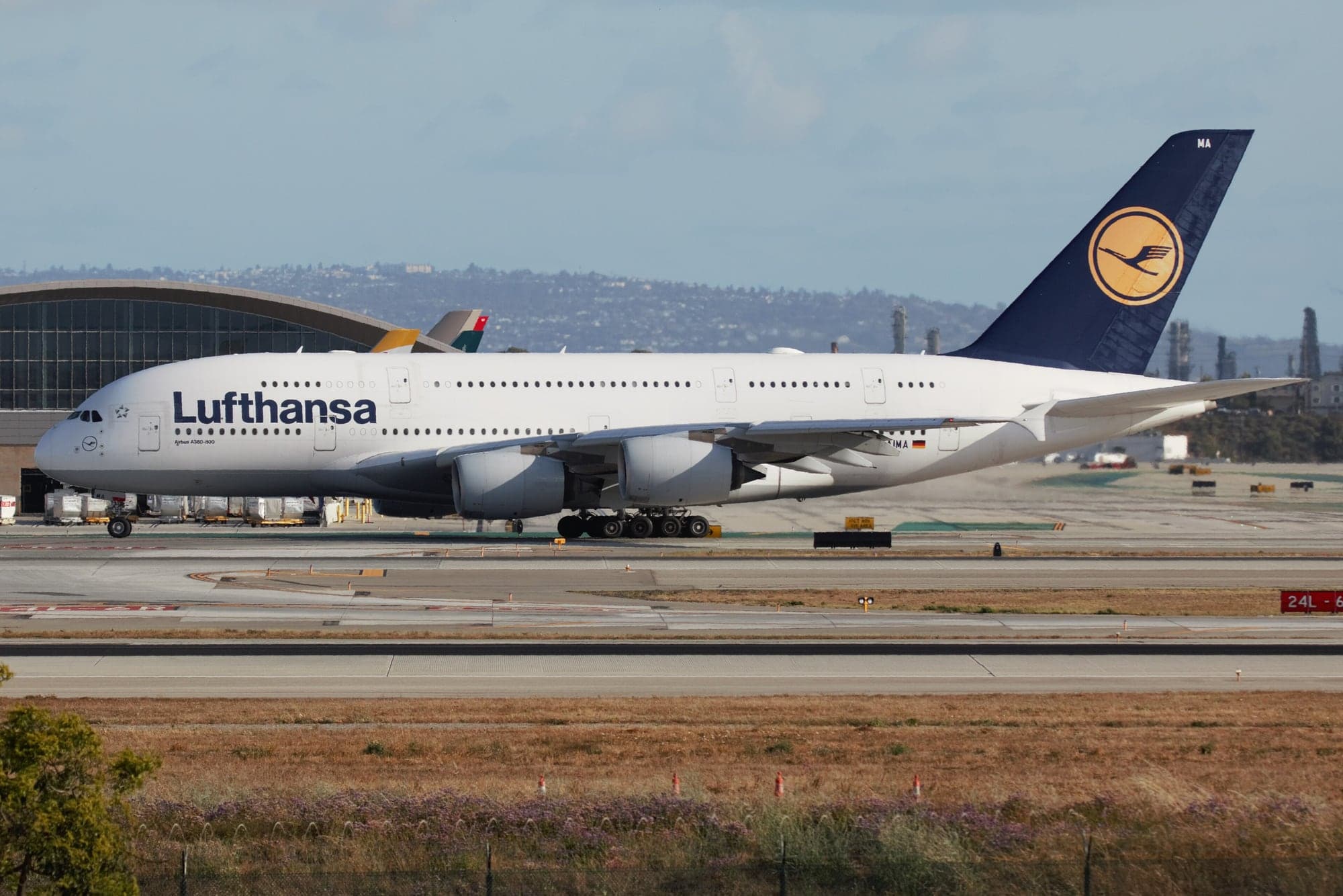 Lufthansa Airbus A380 D-AIMA taxiing for departure at Los Angeles International Airport on 26 April 2026, after the type's return to service.