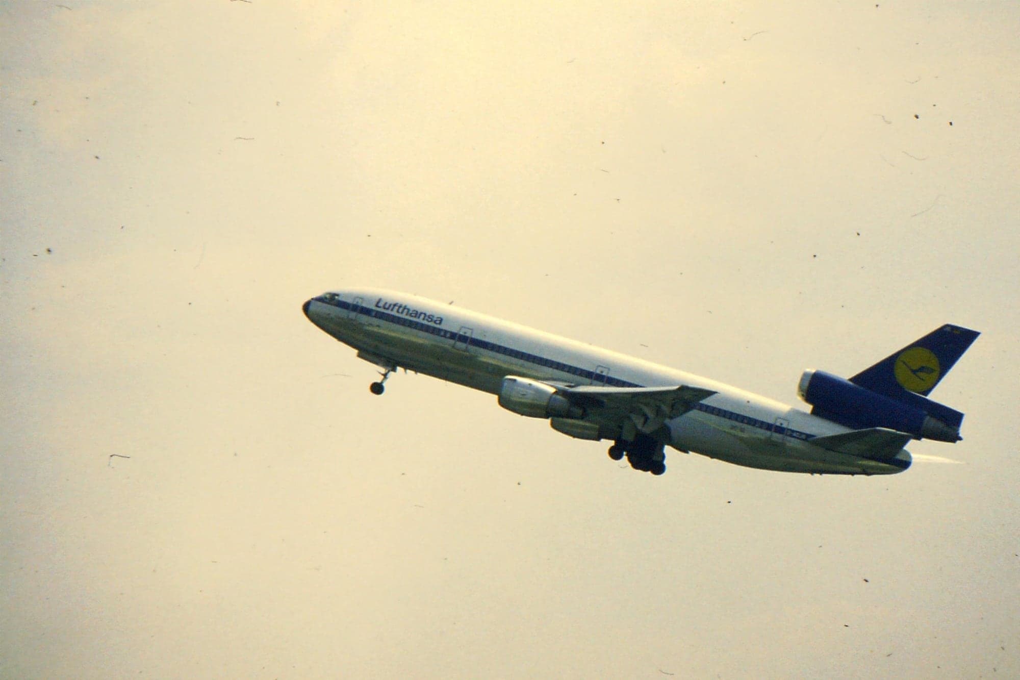 A Lufthansa McDonnell Douglas DC-10-30 climbing out of Frankfurt in August 1983.