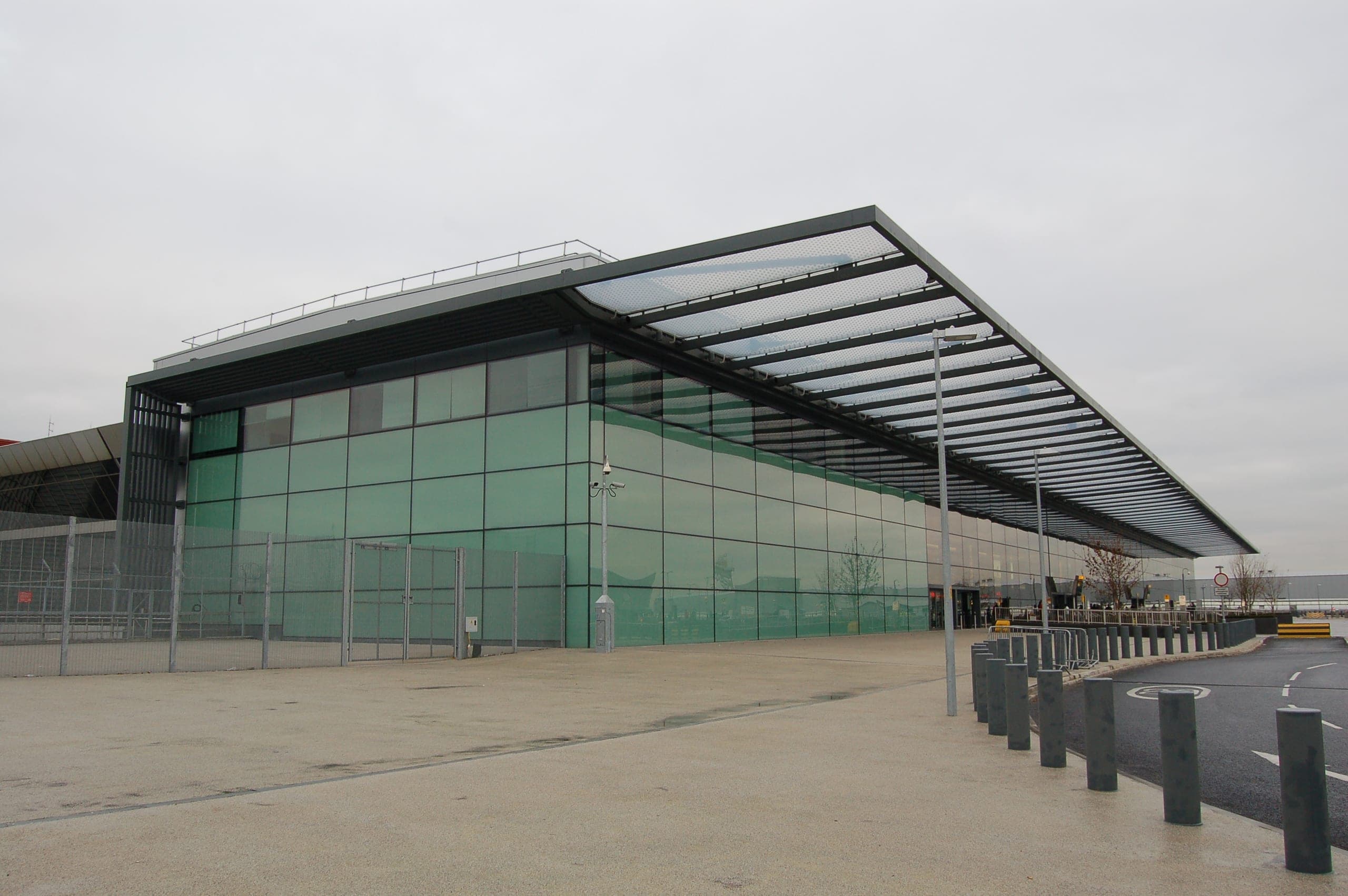 The glazed frontage and cantilevered canopy of Terminal 4, on the south side of the airfield