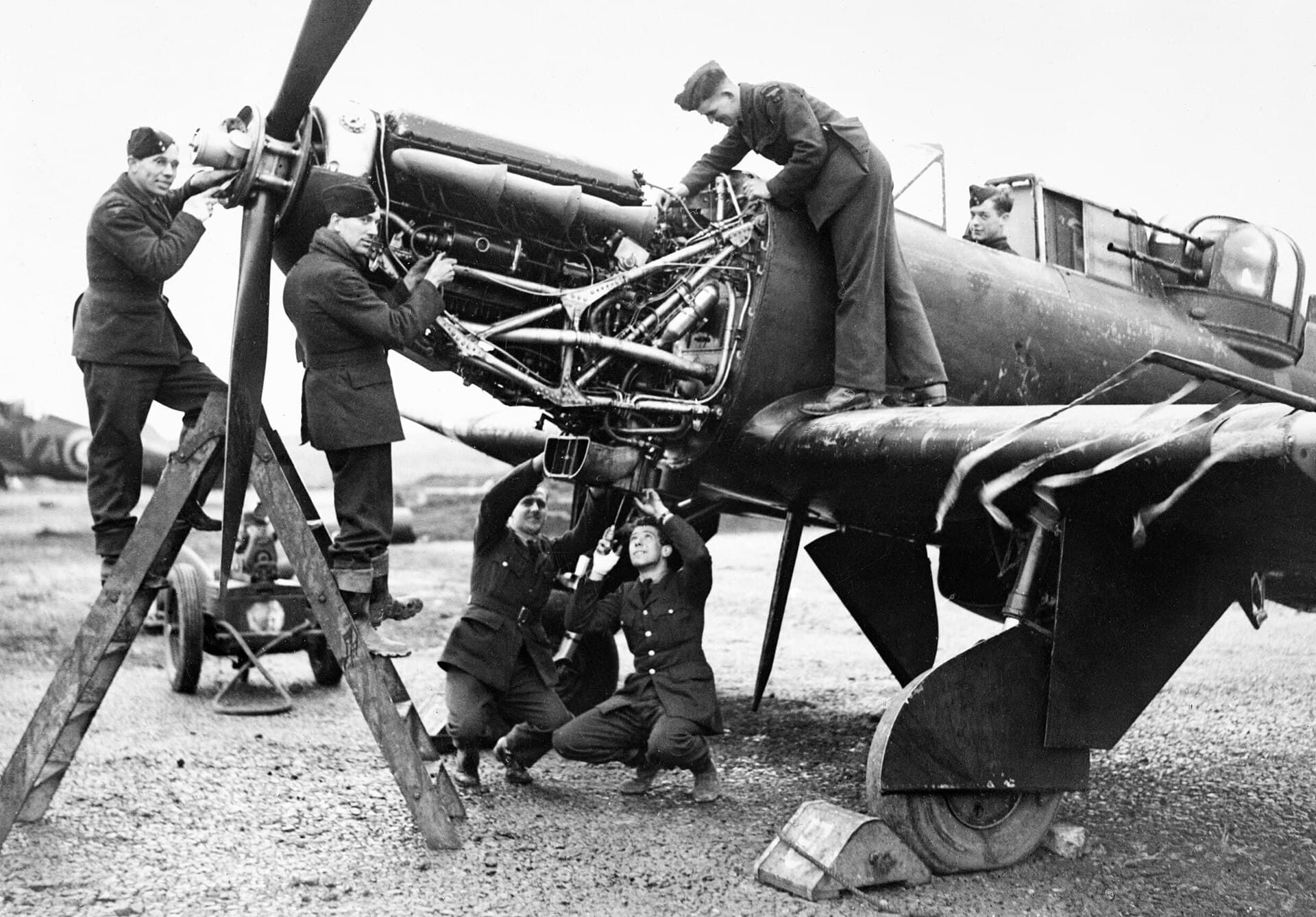 RAF fitters working on the Merlin III of a Boulton Paul Defiant at Fairwood Common, Wales, in January 1942, with the cowling panels removed