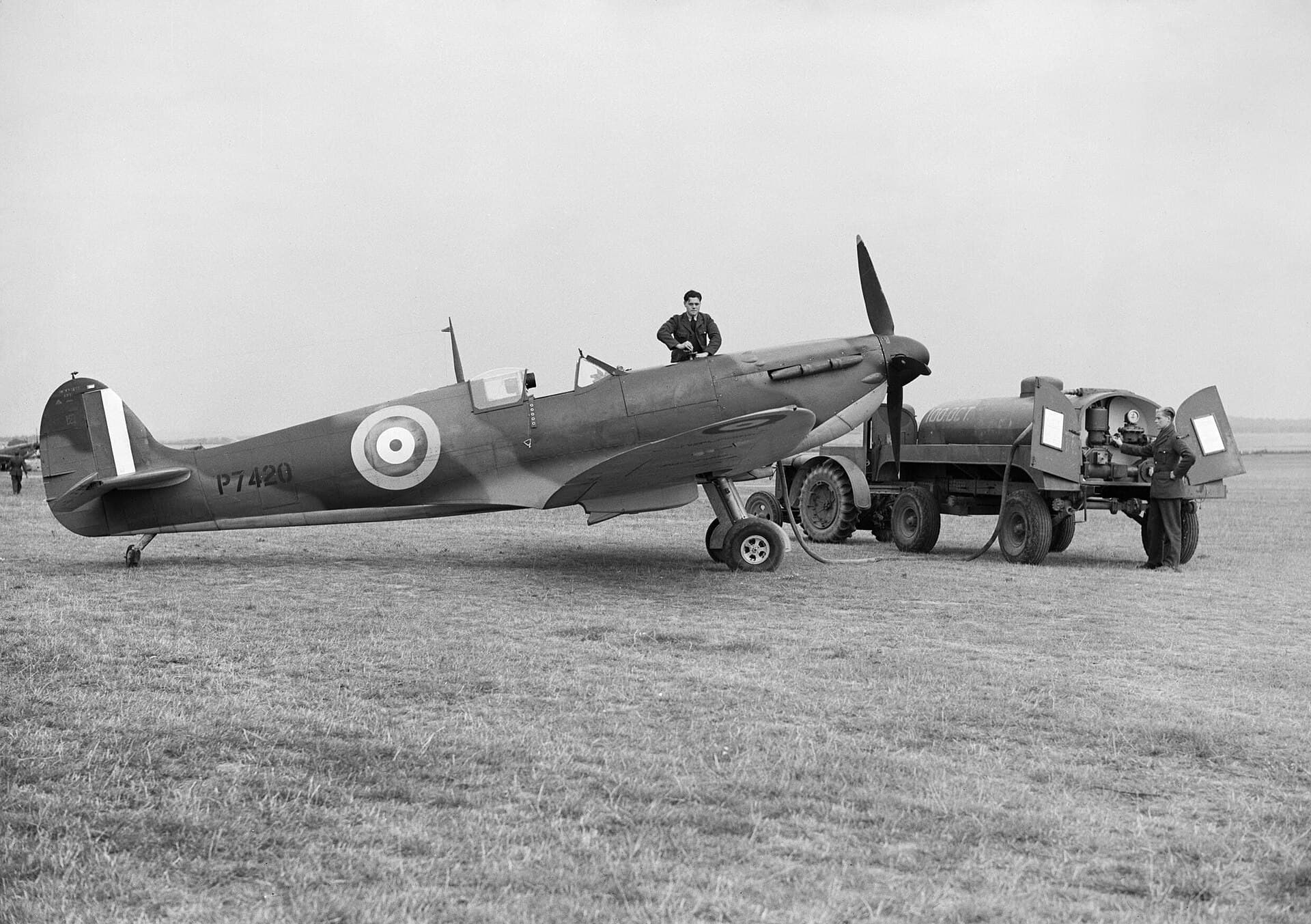 Ground crew refuelling Spitfire Mk IIA P7420 of No. 19 Squadron from a bowser marked 100 OCT at Fowlmere, September 1940