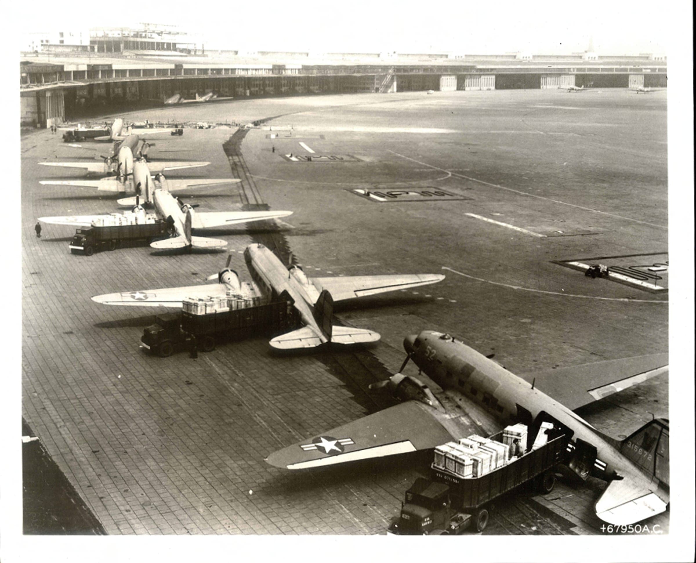 C-47s in the unloading line at Tempelhof, carrying everything from engine crates to milk bottles