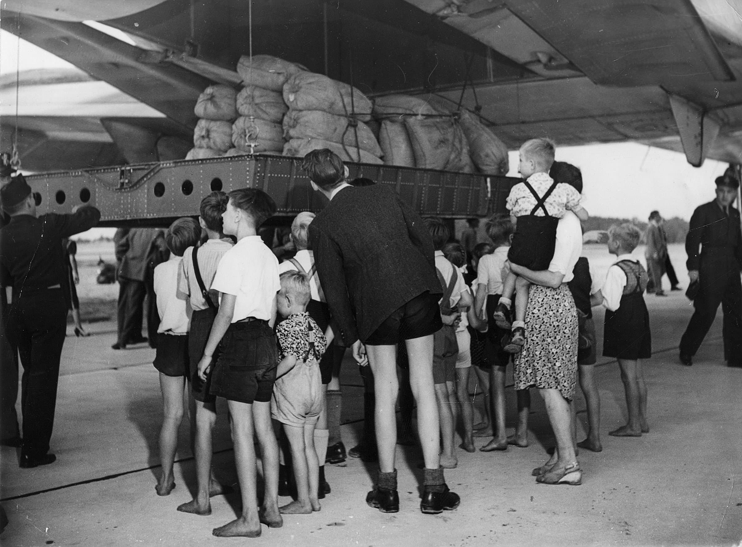 A C-74 Globemaster unloading flour at Berlin Gatow during the airlift