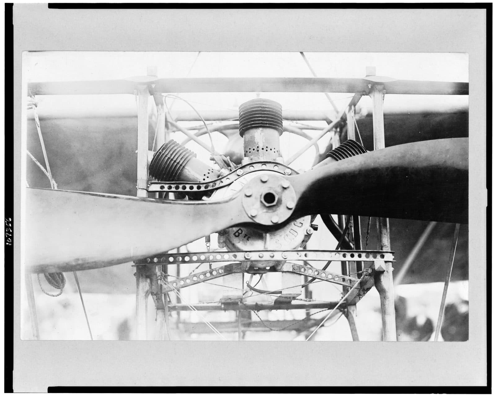 Head-on view of the Blériot XI: the Anzani engine's cylinders fanned above the crankcase, the two-bladed wooden propeller across the frame.