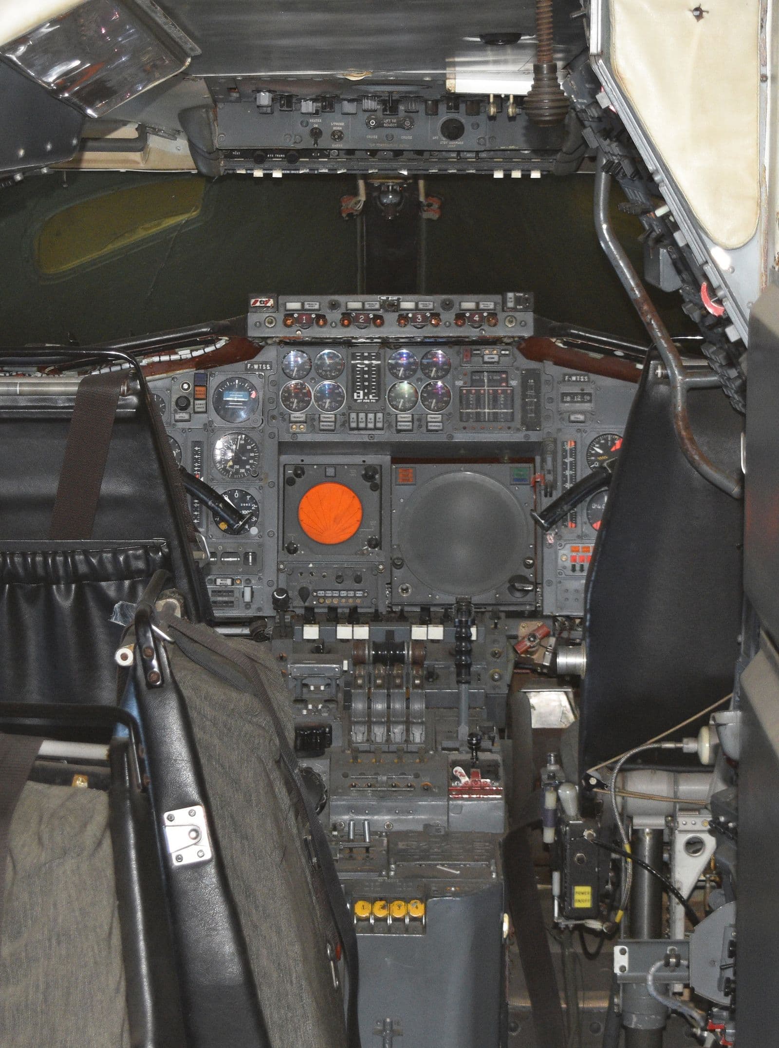 The cockpit of Concorde 001, photographed in 2022, the four crew stations of the prototype, including the flight engineer's panel