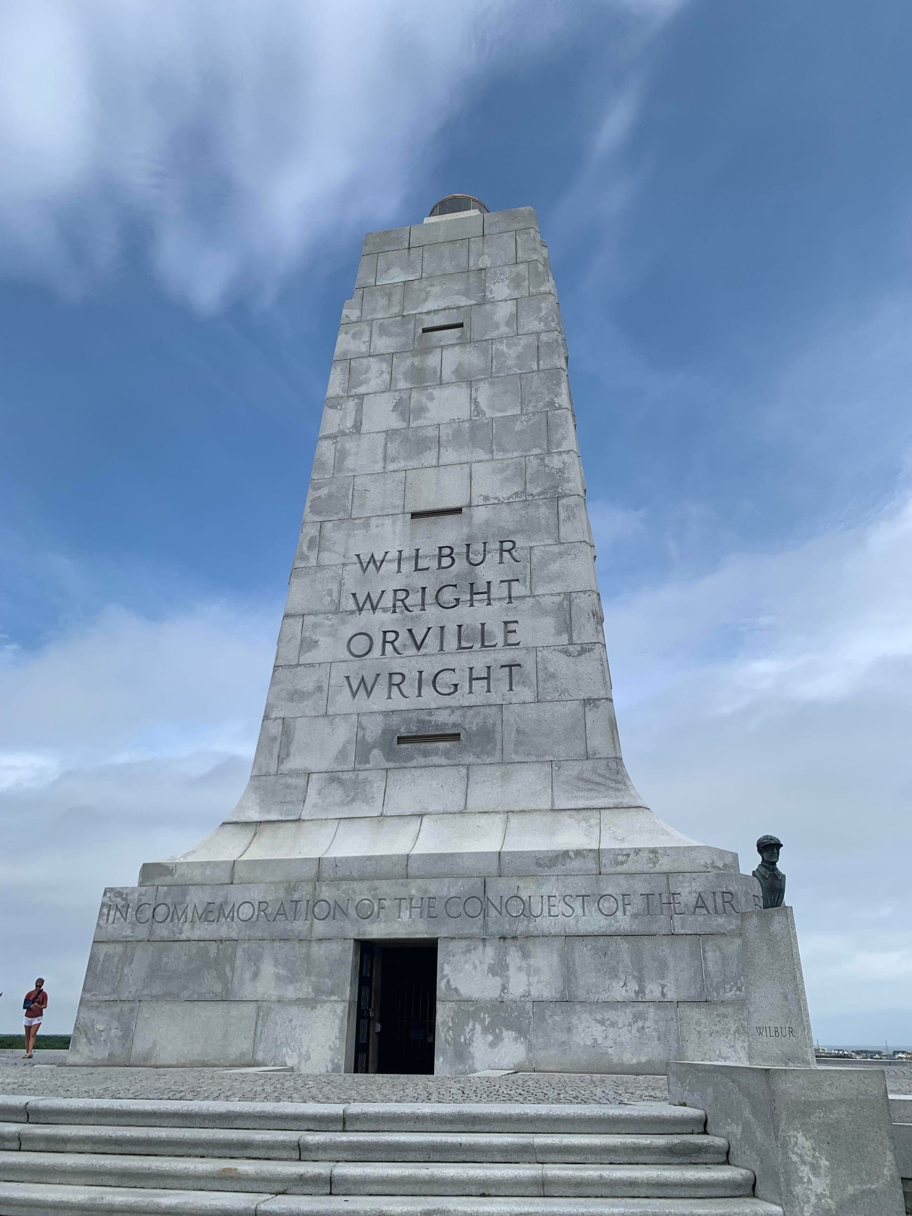 The granite pylon of the Wright Brothers National Memorial standing on Kill Devil Hill.