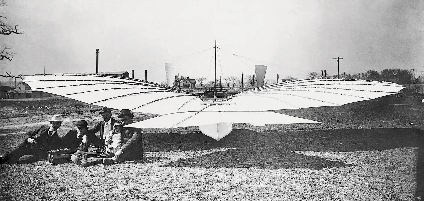 Gustave Whitehead beside his 1901 monoplane No. 21, photographed on the ground near his Bridgeport workshop.