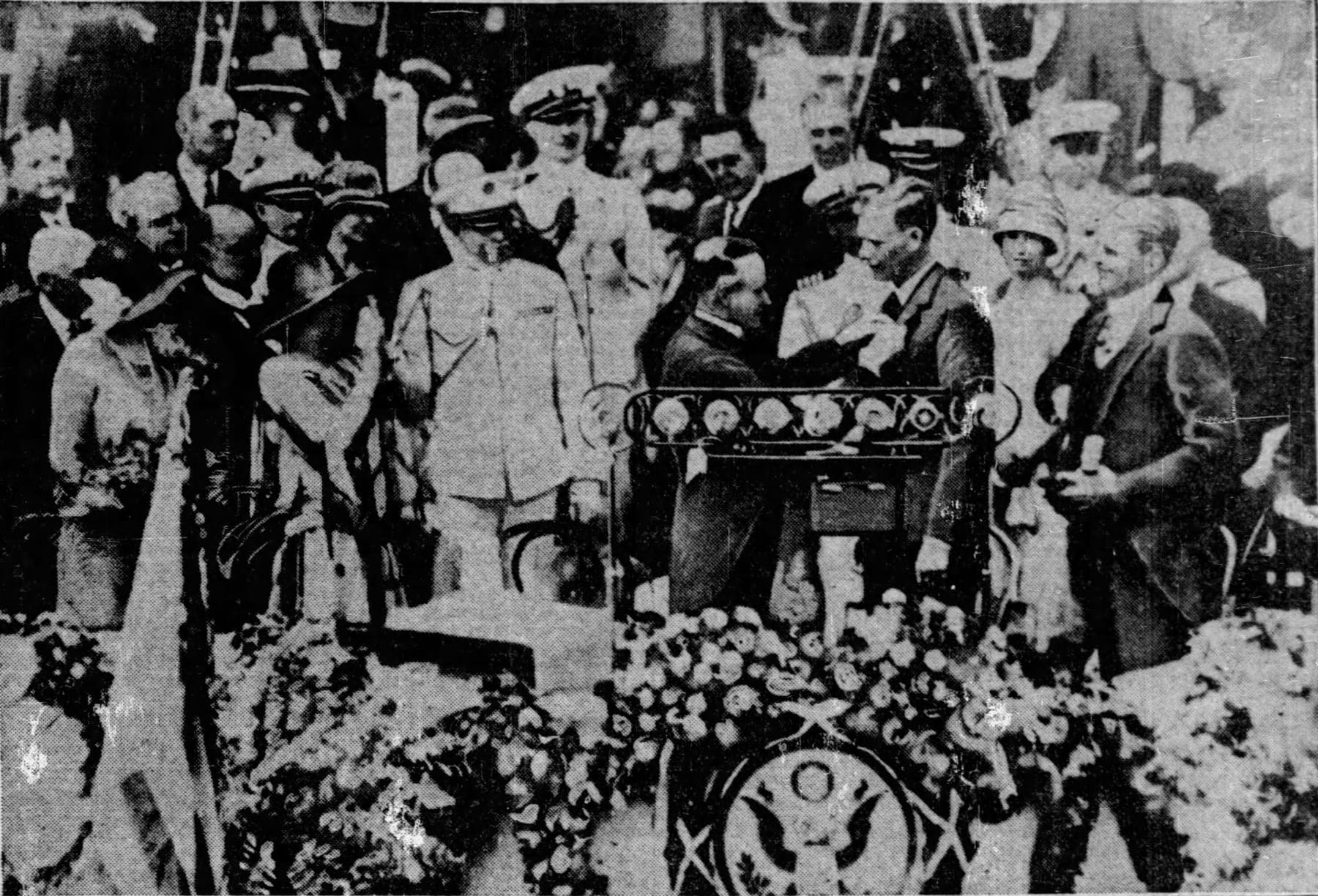 President Calvin Coolidge pinning the Distinguished Flying Cross on Lindbergh's lapel in Washington.