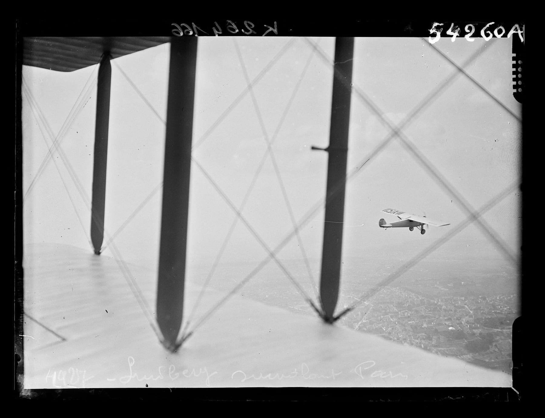 The Spirit of St. Louis photographed from another aircraft as Lindbergh flew over Paris in the days after his arrival.