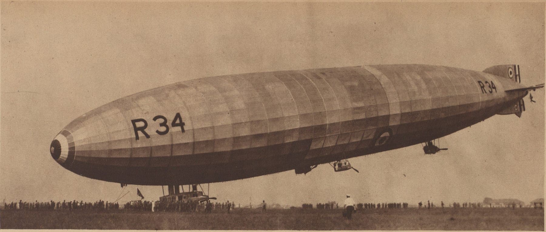 The British airship R34 landing on Long Island in July 1919 after the first east-west crossing of the Atlantic by air.