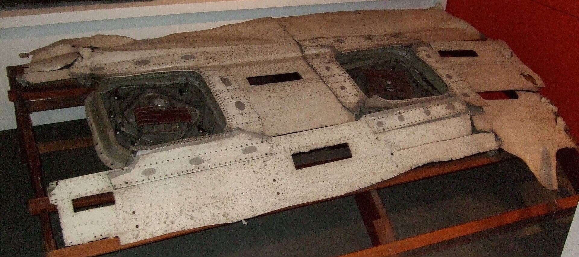 The recovered section of upper fuselage from Comet G-ALYP, with the direction-finder window cut-outs where fatigue cracking began