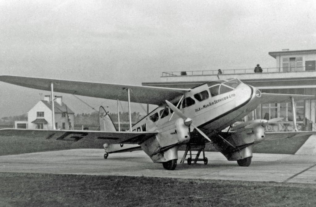 A DH.89 Dragon Rapide twin-engined biplane airliner of Isle of Man Air Services at Manchester in 1938