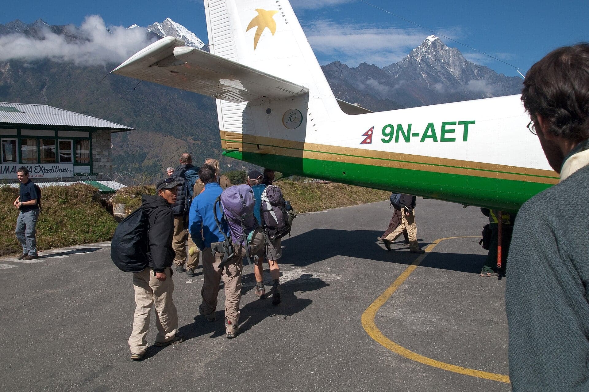 A Yeti Airlines DHC-6 Twin Otter on the short sloping runway at Lukla, in the Himalayas of Nepal