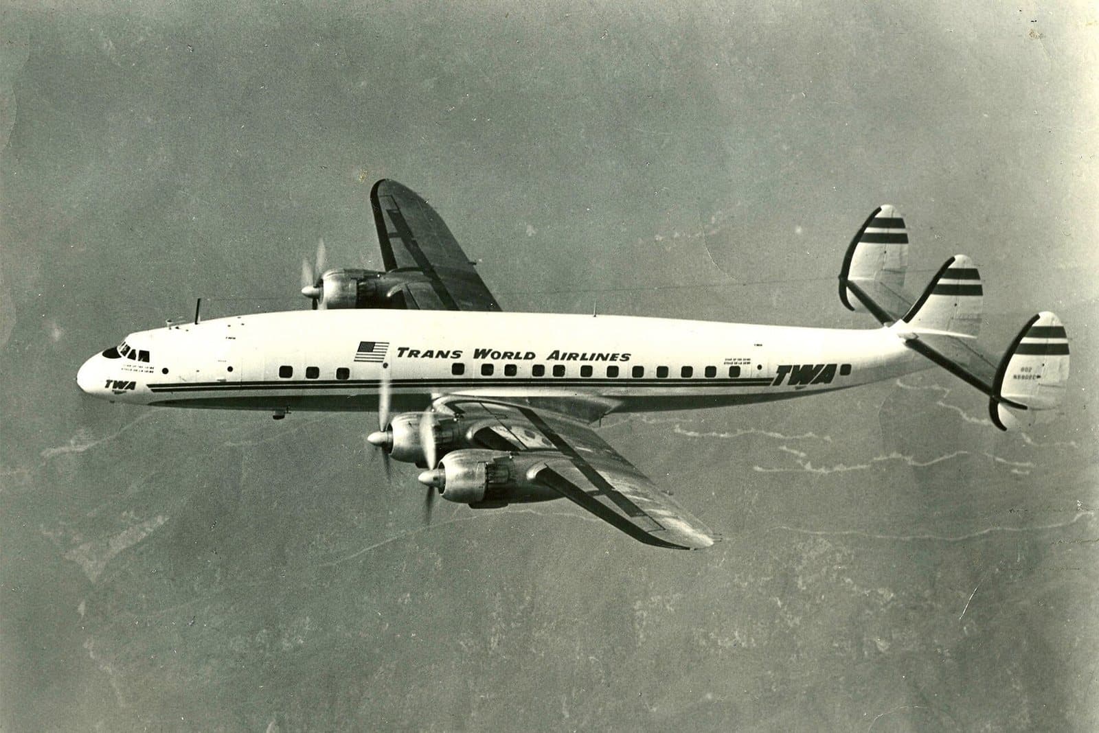 A TWA Lockheed L-1049A Super Constellation, 'Star of the Seine', in flight with its triple tail