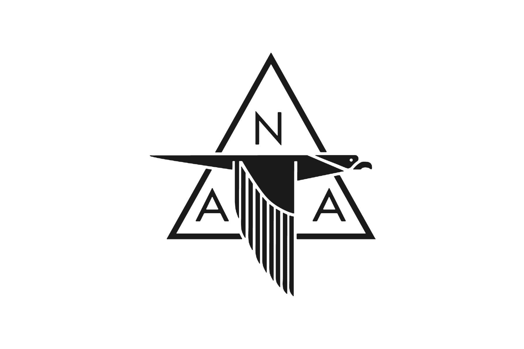 The North American Aviation emblem: an eagle in flight across a triangle carrying the letters N, A and A, in black on white