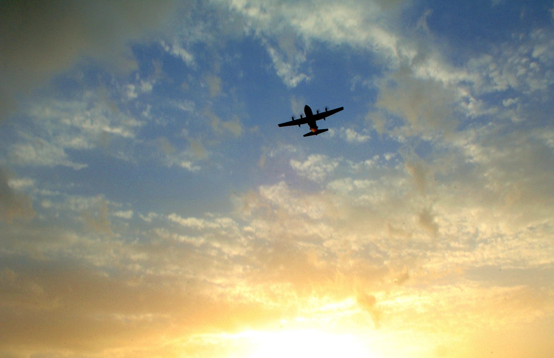 A C-130 Hercules taking off after unloading cargo at Balad Air Base, Iraq, in 2007