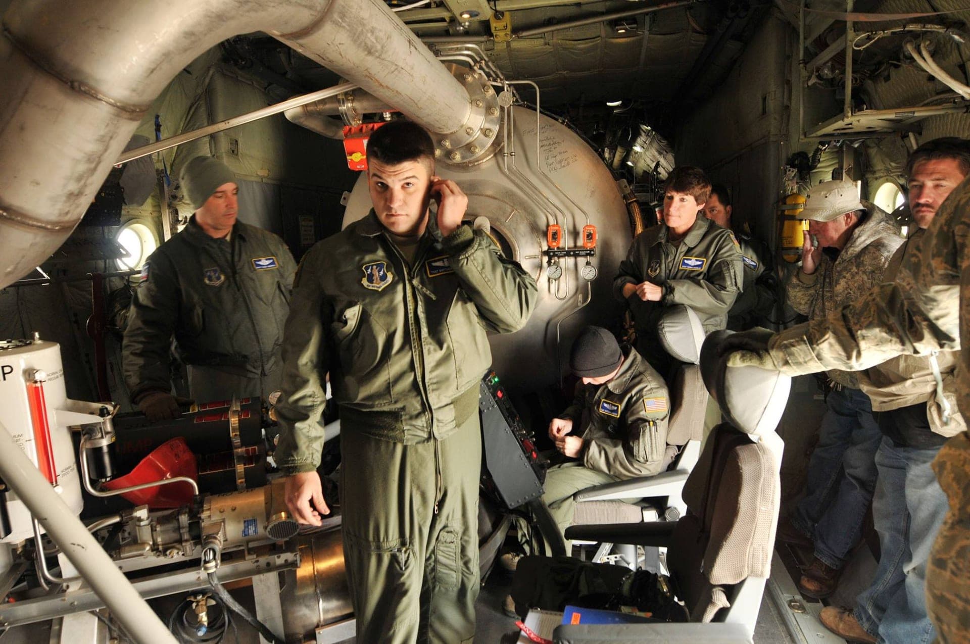 A National Guard C-130 fitted with a Modular Airborne Firefighting System during training, 2014