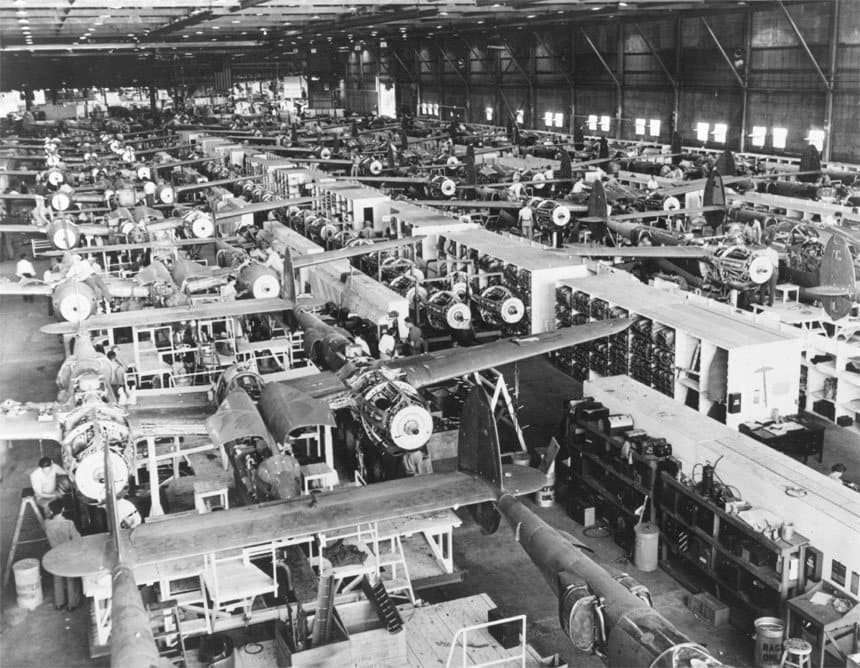 Three parallel moving assembly lines of P-38 Lightning centre sections at Lockheed